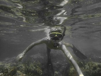 Boy snorkeling in sea