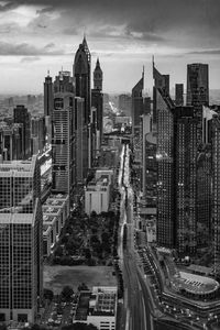 High angle view of buildings in city against sky