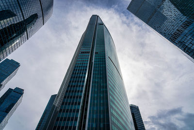 Low angle view of modern buildings against sky