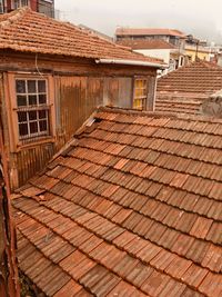 Exterior of old building in town against sky