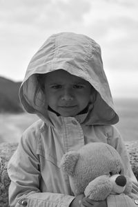 Portrait of cute girl with toy