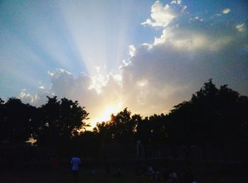 Scenic view of landscape against cloudy sky