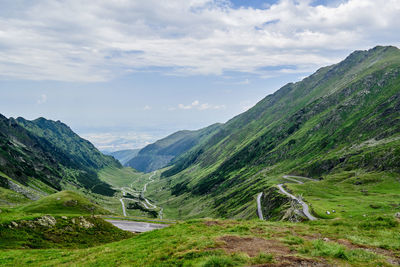 Transfagarasan through the fagaras mountains with green vegetation