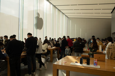 Group of people standing on table