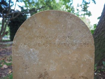 Close-up of cross on cemetery