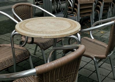 High angle view of empty chairs in cafe