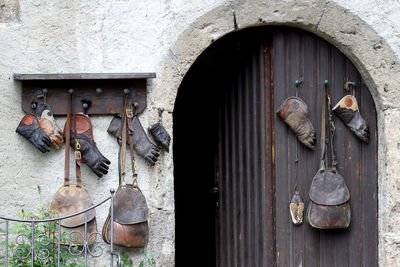 Close-up of clothes hanging on door