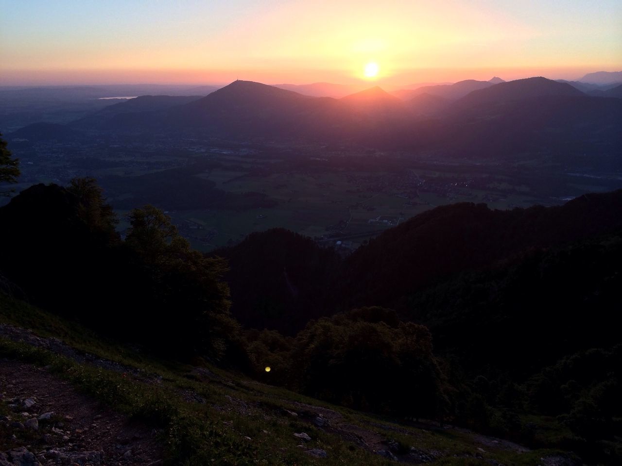 mountain, sunset, tranquil scene, scenics, tranquility, sun, mountain range, beauty in nature, landscape, nature, sky, idyllic, sunlight, orange color, non-urban scene, silhouette, sunbeam, majestic, outdoors, remote