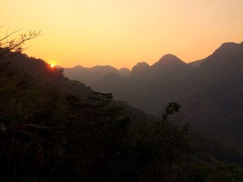 Scenic view of mountains at sunset