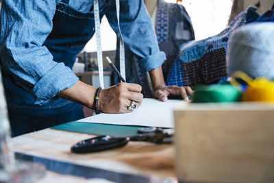 High angle view of man working on table