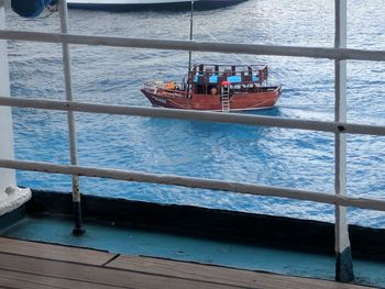 High angle view of boat sailing on sea