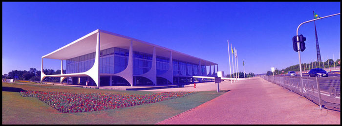 View of modern building against blue sky