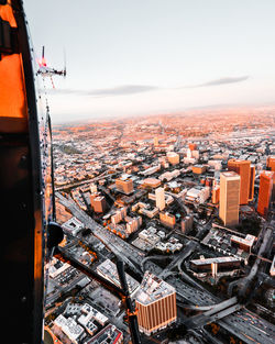 High angle view of buildings in city against sky