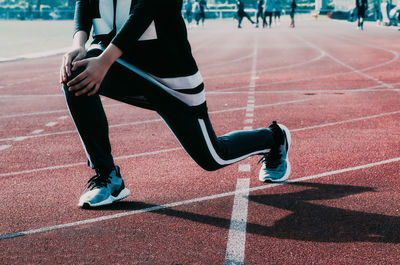 Low section of person on sports track