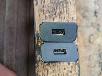 Close-up of old telephone on wall