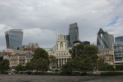 Modern buildings against sky in city