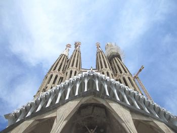 Low angle view of sagrada familia against sky