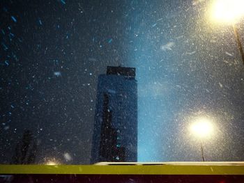 Scenic view of building against sky at night