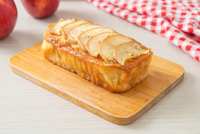 High angle view of bread on cutting board