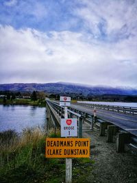 Warning sign on calm sea