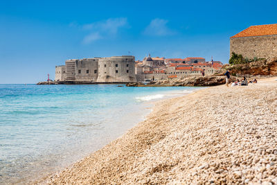 The beautiful banje beach and dubrovnik city