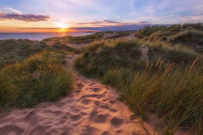 Scenic view of sea against sky during sunset