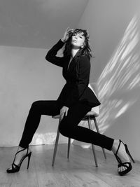 Black and white woman on a chair fashion 