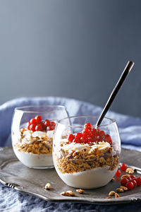 Close-up of granola in glasses on table