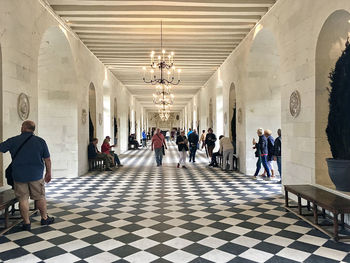 Group of people in corridor of building