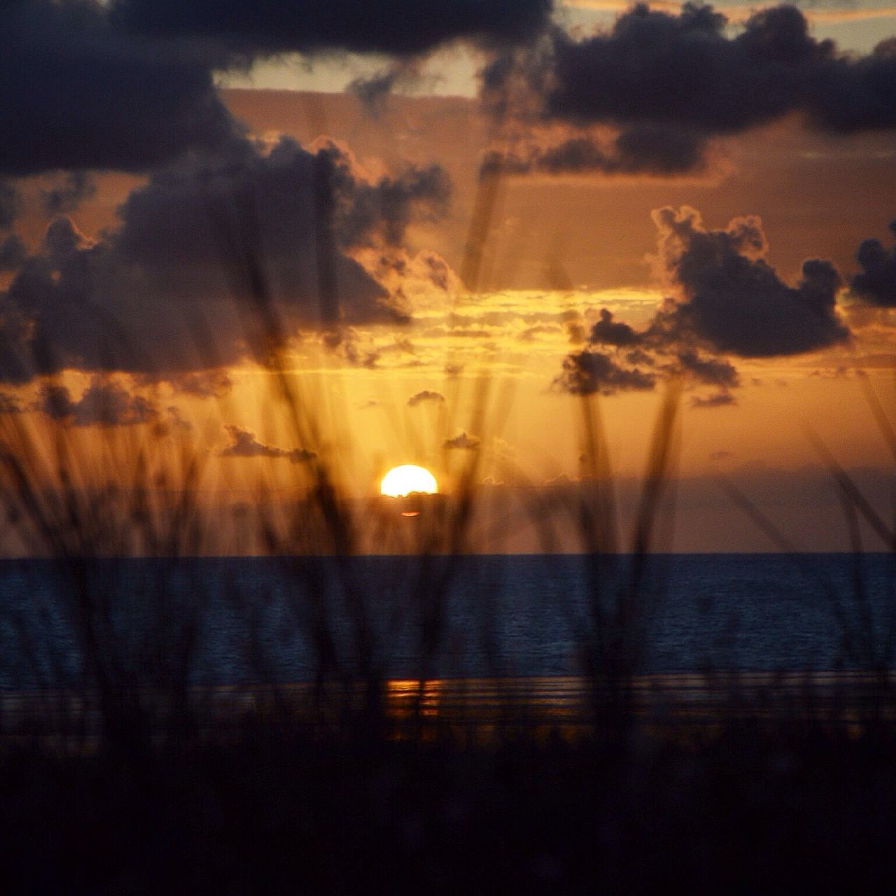 sunset, water, sky, beauty in nature, horizon over water, tranquil scene, scenics, sea, tranquility, orange color, nature, cloud - sky, sun, reflection, idyllic, beach, silhouette, cloud, outdoors, sunlight