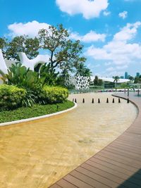 View of swimming pool against cloudy sky