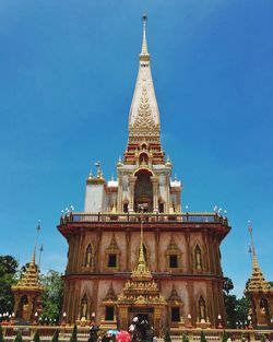 Low angle view of temple against clear blue sky