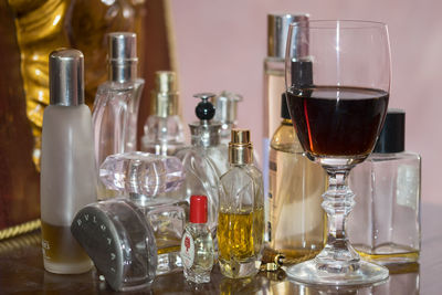 Close-up of wine glasses on table