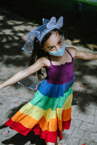 Full length of cute girl wearing hat