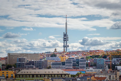 Buildings in city against sky