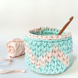 Close-up of multi colored basket on white background