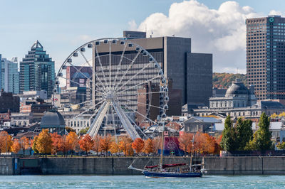 View of ferris wheel in city