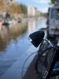 Close-up of bicycle in river