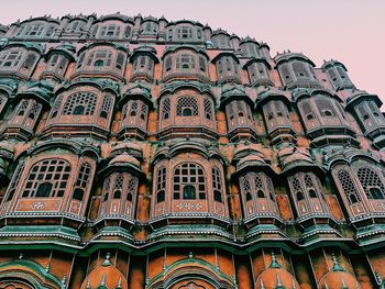 Low angle view of ornate building against sky