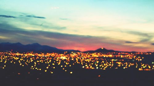 Illuminated cityscape at night