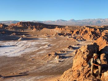 Scenic view of dramatic landscape against clear sky at valle de la luna atacama desert 