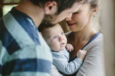 Mother and father with baby boy