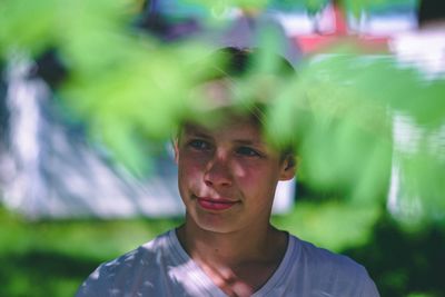 Portrait of smiling young woman outdoors