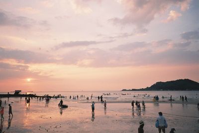 Scenic view of beach against sky during sunset