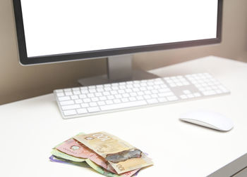 Close-up of laptop on table