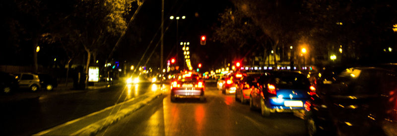 Light trails on road at night