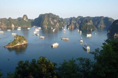 Scenic view of boats in lake