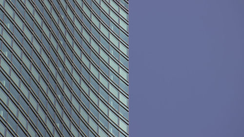 Low angle view of modern building against clear sky