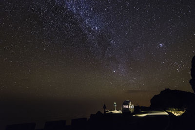 Scenic view of star field against sky at night