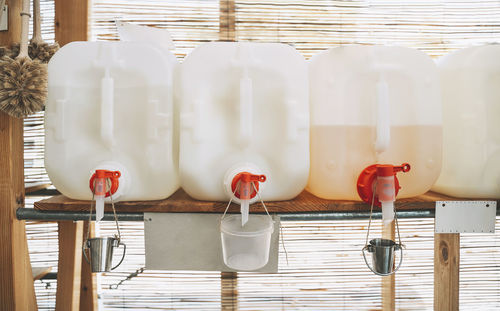 Body care products in white containers at convenience store